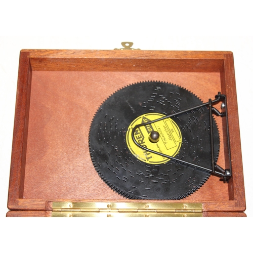 1418 - A vintage Thorens of Switzerland musical box with a large qty of metal discs and a clockwork movemen... 