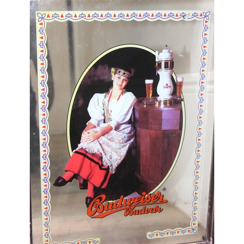 371 - Vintage Budweiser Budvar picture mirror in frame and a Player's advertising picture, largest approx ... 