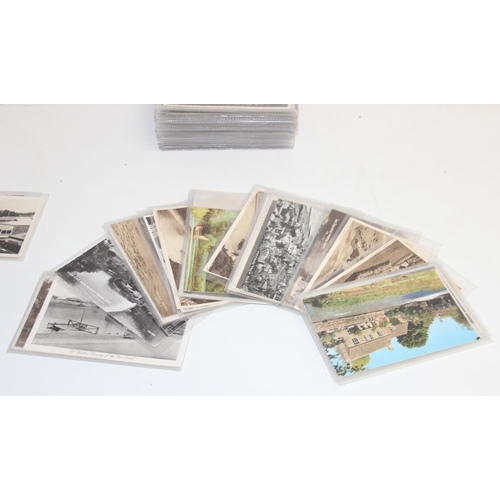 524 - Qty of antique and later postcards, many with stamp marks