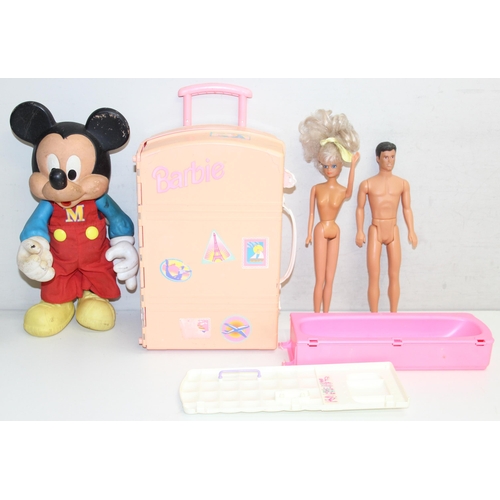 610 - Mix of vintage toys to incl Barbie travelling house suitcase and associated dolls, and a Mickey Mous... 