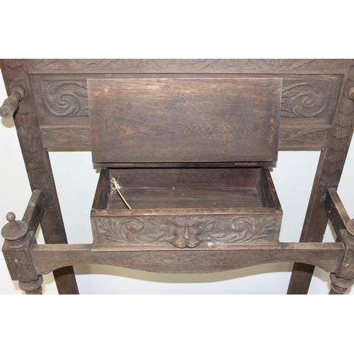 78 - Antique carved oak hallstand with Green Man mask decoration, approx 103cm x 30cm x 189cm