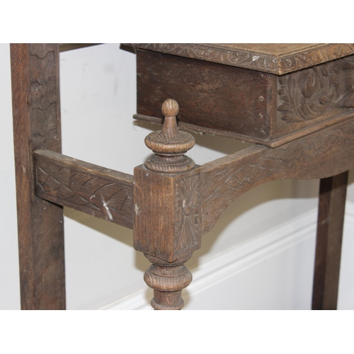 78 - Antique carved oak hallstand with Green Man mask decoration, approx 103cm x 30cm x 189cm