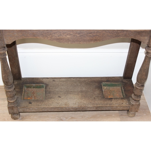 78 - Antique carved oak hallstand with Green Man mask decoration, approx 103cm x 30cm x 189cm