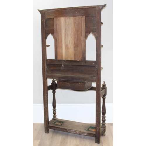 78 - Antique carved oak hallstand with Green Man mask decoration, approx 103cm x 30cm x 189cm