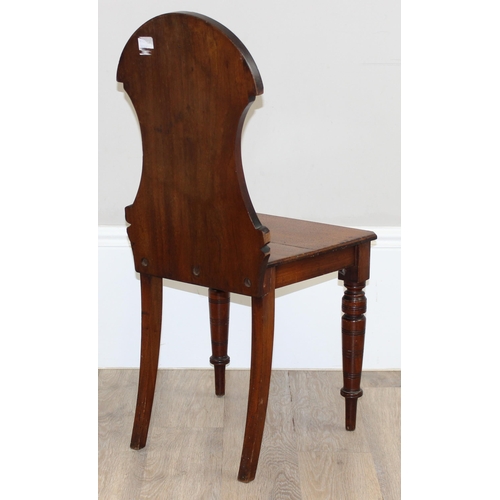 88 - A pair of Victorian mahogany hall chairs with carved backs, both approx 90cm tall