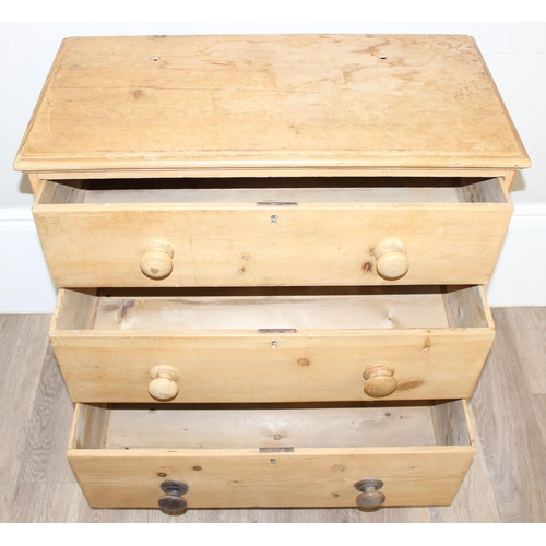 7 - An antique pine 3 drawer chest of drawers with bun handles, approx 79cm wide x 40cm deep x 82cm tall