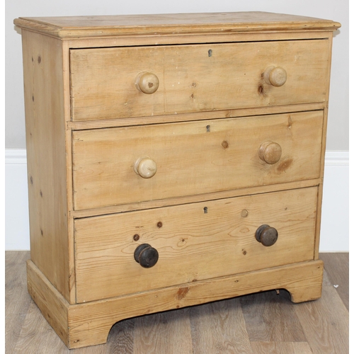 7 - An antique pine 3 drawer chest of drawers with bun handles, approx 79cm wide x 40cm deep x 82cm tall