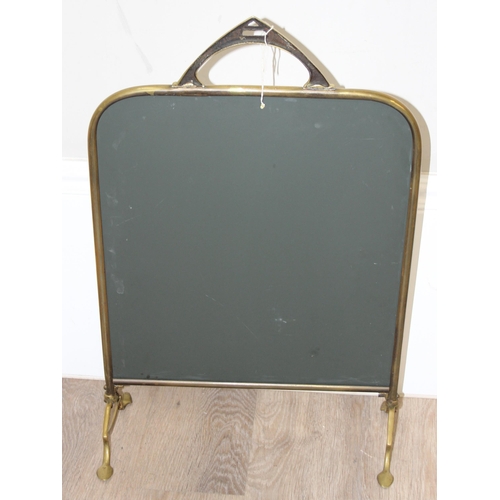 40 - 2 vintage brass and mirror glass fire screens, the largest approx 65cm tall