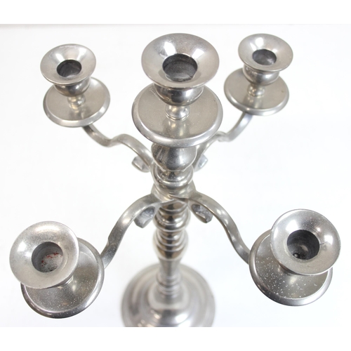 1034 - A large pair of silver plated 5 branch candelabras, unmarked, each approx 52cm tall