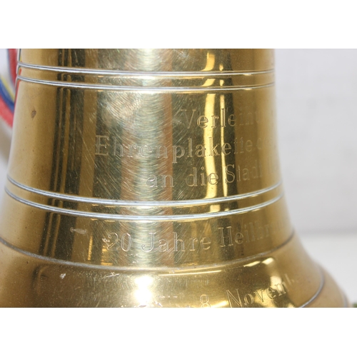 1411 - A vintage cast brass bell with engraving for Heilbronn of Germany, approx 18cm tall