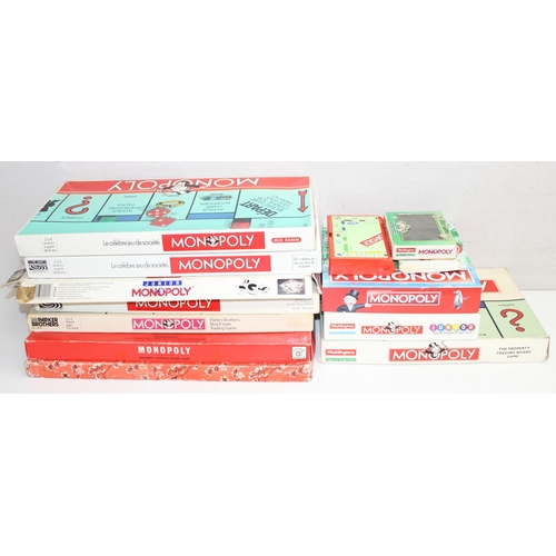 619 - 13 assorted vintage Monopoly editions to include a Monopoly kids edition etc