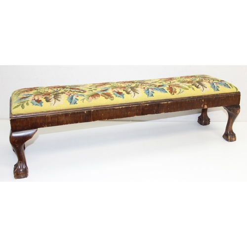 101 - A long low antique tapestry topped footstool with ball and claw feet, approx 93cm wide x 25cm deep x... 