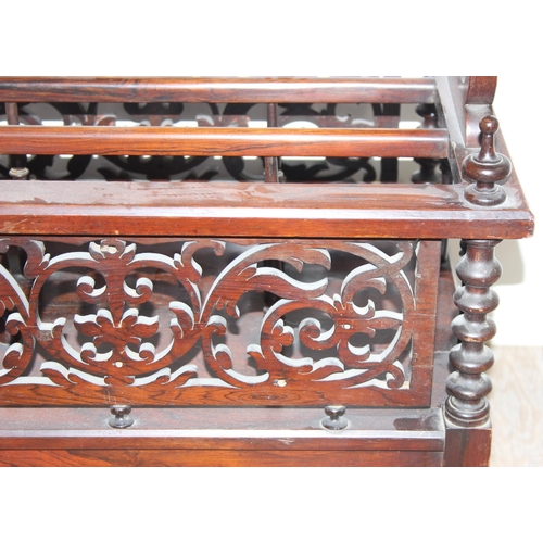 155 - A 19th century Rosewood canterbury whatnot with pierced gallery back, side splats and pierced canter... 