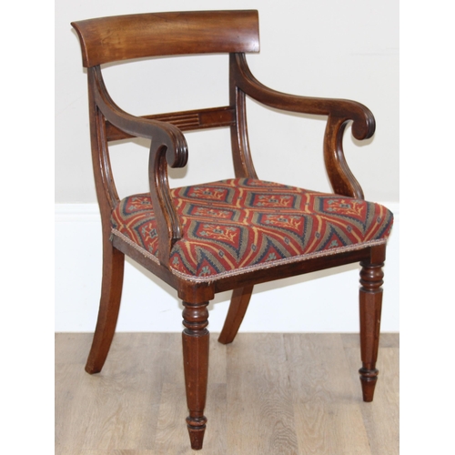 117 - A 19th century mahogany scroll arm carver or library chair, T.R. Roberts of Islington ivorine plaque... 