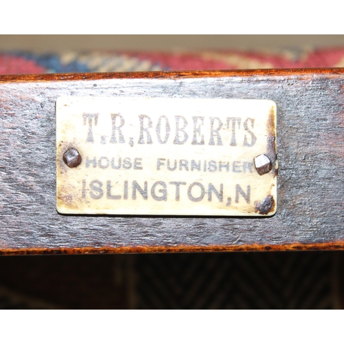 117 - A 19th century mahogany scroll arm carver or library chair, T.R. Roberts of Islington ivorine plaque... 