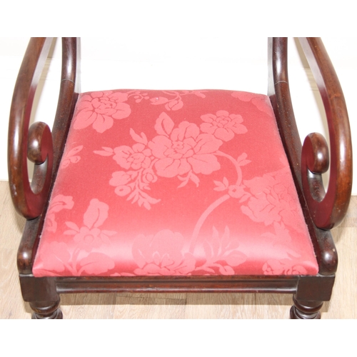 139 - A Georgian scroll arm mahogany carver or library chair with later upholstered red fabric seat, appro... 