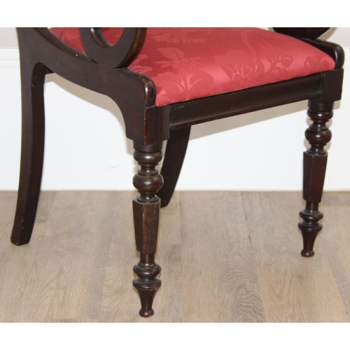 139 - A Georgian scroll arm mahogany carver or library chair with later upholstered red fabric seat, appro... 