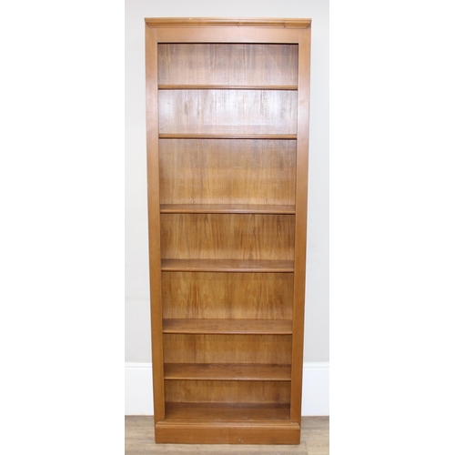 175 - A large modern stained pine bookcase with 6 adjustable shelves, approx 85cm wide x 27cm deep x 232cm... 