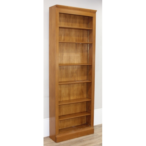 175 - A large modern stained pine bookcase with 6 adjustable shelves, approx 85cm wide x 27cm deep x 232cm... 