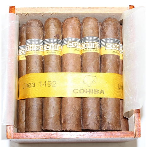 1400 - 25 Cohiba Robusto Cigars in opened slide lid wooden cabinet box, still wrapped in ribbon and paper, ... 