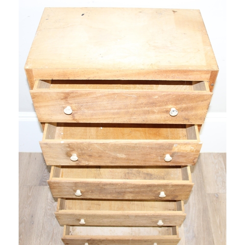 44 - A tall light wood 5 drawer chest of drawers, approx 61cm wide x 37cm deep x 100cm tall