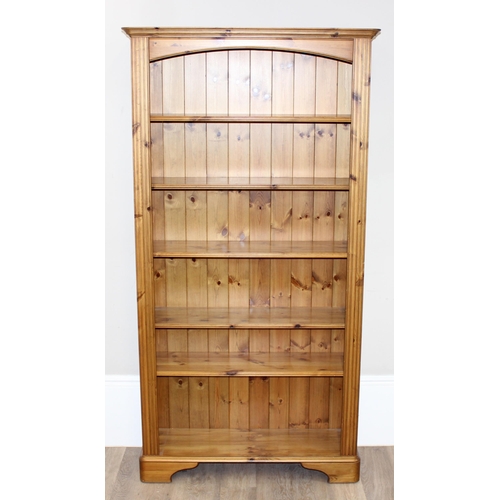 48 - Pine bookcase with adjustable shelves, approx 100cm x 32cm x 189cm