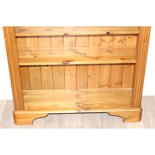 48 - Pine bookcase with adjustable shelves, approx 100cm x 32cm x 189cm