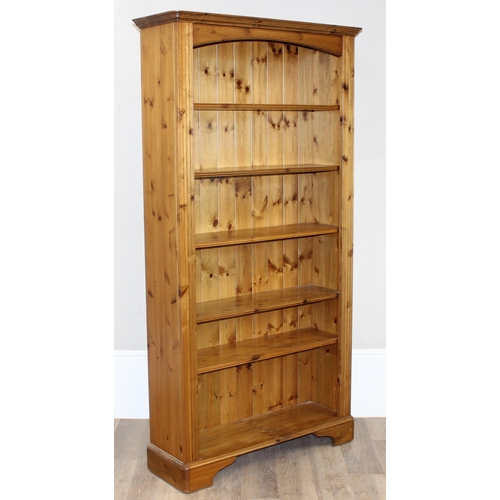 48 - Pine bookcase with adjustable shelves, approx 100cm x 32cm x 189cm