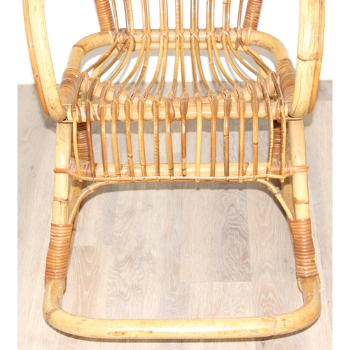 137 - In the manner of Franco Albini, a retro bamboo rocking chair, approx 56cm wide x 116cm tall