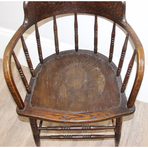 43 - A vintage polished oak Captain's chair with Thonet style seat, approx 56cm wide x 80cm tall