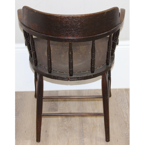 43 - A vintage polished oak Captain's chair with Thonet style seat, approx 56cm wide x 80cm tall