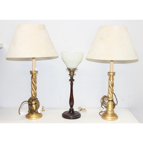 246 - A pair of giltwood barleytwist table lamps with shades, by Peter Martin Designs, and a vintage woode... 