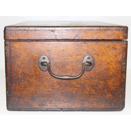 294 - An antique oak silver chest with brass handles and plaque, label to interior for Elkington & Co of L... 