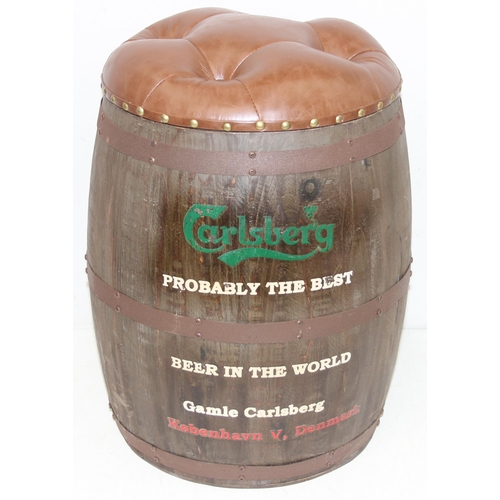 166 - A vintage style barrel formed stool with faux leather button top and Carlsberg related advertising, ... 