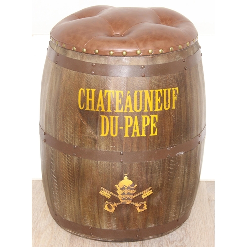 167 - A vintage style barrel formed stool with faux leather button top and Chateauneuf Du-Pape related adv... 