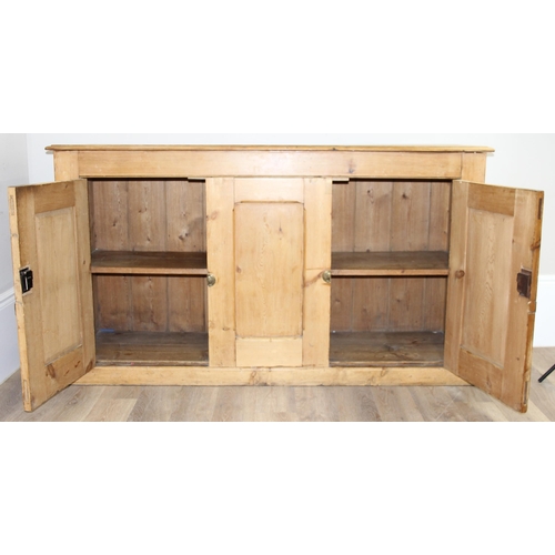 2 - An antique pine 3 door sideboard with brass latches, approx 173cm wide x 51cm deep x 97cm tall