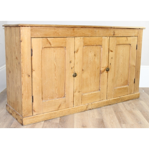 2 - An antique pine 3 door sideboard with brass latches, approx 173cm wide x 51cm deep x 97cm tall