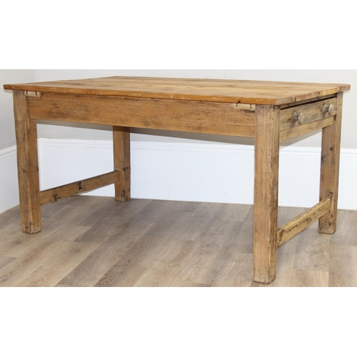 3 - An antique rustic pitch pine farmhouse table with single drawer, approx 145cm wide x 89cm deep x 75c... 