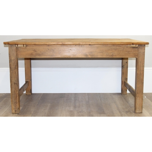 3 - An antique rustic pitch pine farmhouse table with single drawer, approx 145cm wide x 89cm deep x 75c... 