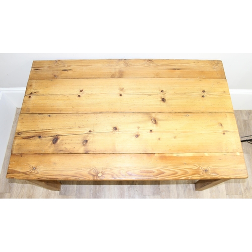 3 - An antique rustic pitch pine farmhouse table with single drawer, approx 145cm wide x 89cm deep x 75c... 