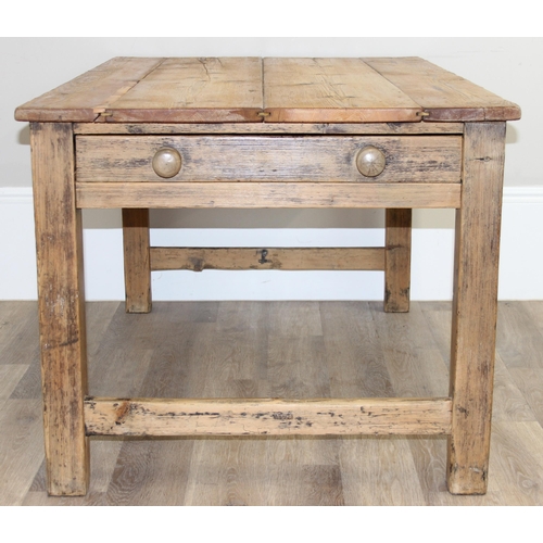 3 - An antique rustic pitch pine farmhouse table with single drawer, approx 145cm wide x 89cm deep x 75c... 