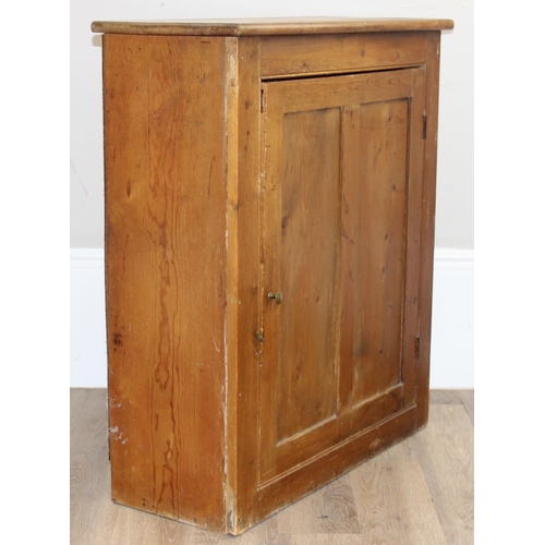 142 - A vintage stripped pine cupboard with interior shelf, approx 80cm wide x 32cm deep x 91cm tall