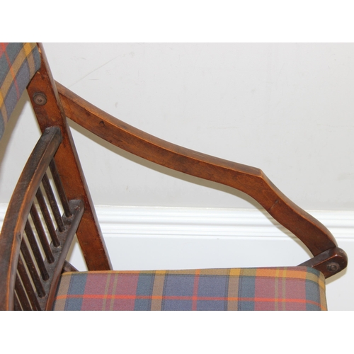 99 - An antique folding mahogany campaign chair with later tartan upholstery, approx 51cm wide x 102cm ta... 