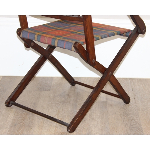 99 - An antique folding mahogany campaign chair with later tartan upholstery, approx 51cm wide x 102cm ta... 