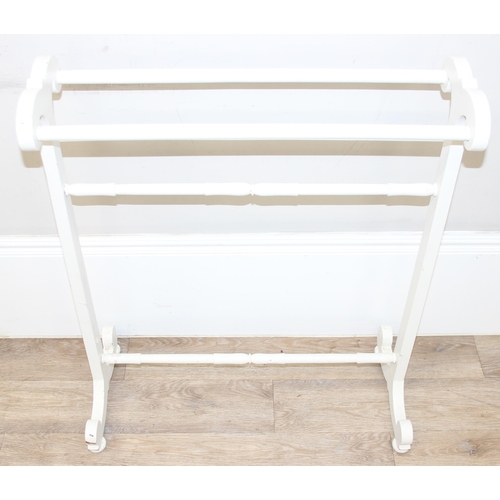 113 - A vintage white painted towel rail and a white painted pine wall shelf, the towel rail approx 72cm w... 