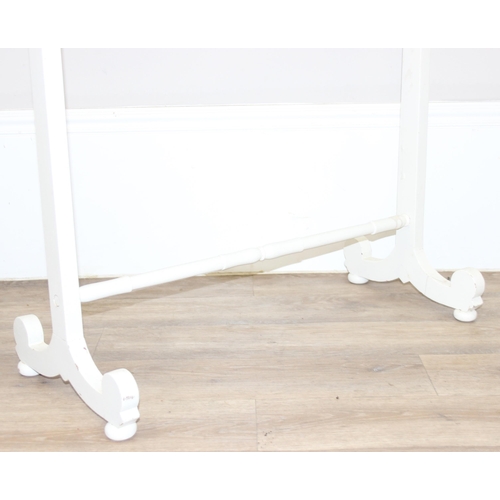 113 - A vintage white painted towel rail and a white painted pine wall shelf, the towel rail approx 72cm w... 