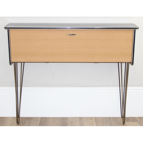 32 - An unusual retro desk type sideboard with black Formica top and metal hairpin legs, fold down front ... 