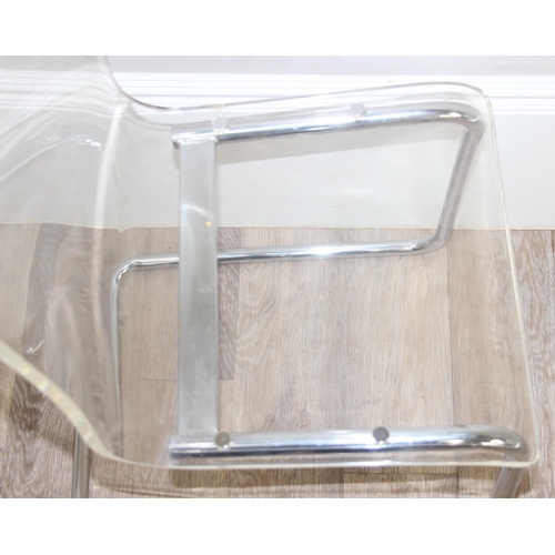 110 - A pair of retro style clear Perspex and chrome legged 