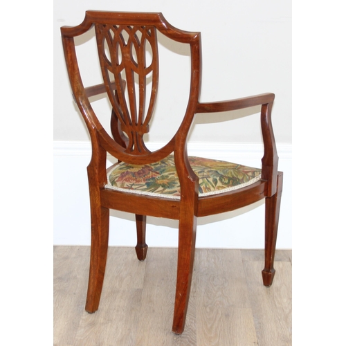 112 - An antique shield backed bedroom chair with inlaid details, approx 50cm wide x 80cm tall