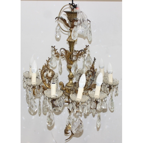 248 - A large and heavy vintage crystal and gilt metal 3 branch chandelier, each branch splitting into 3 t... 